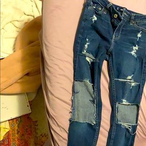 Girls dark blue mid rise skinny jeans ripped